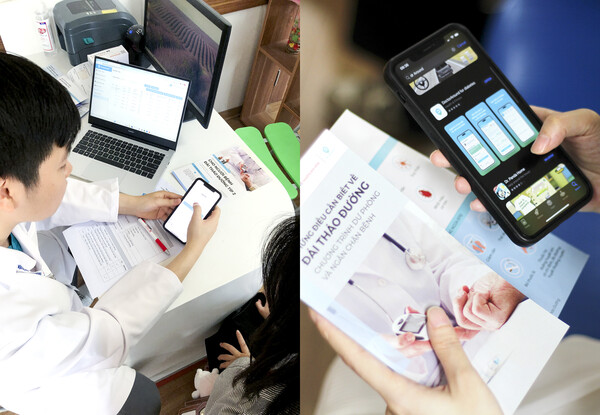 베트남 하노이의대병원에서 의료진이 KT의 비대면 케어 서비스 앱 ‘닥터어라운드’ 사용법을 환자들에게 설명하고 있다./ 사진=KT